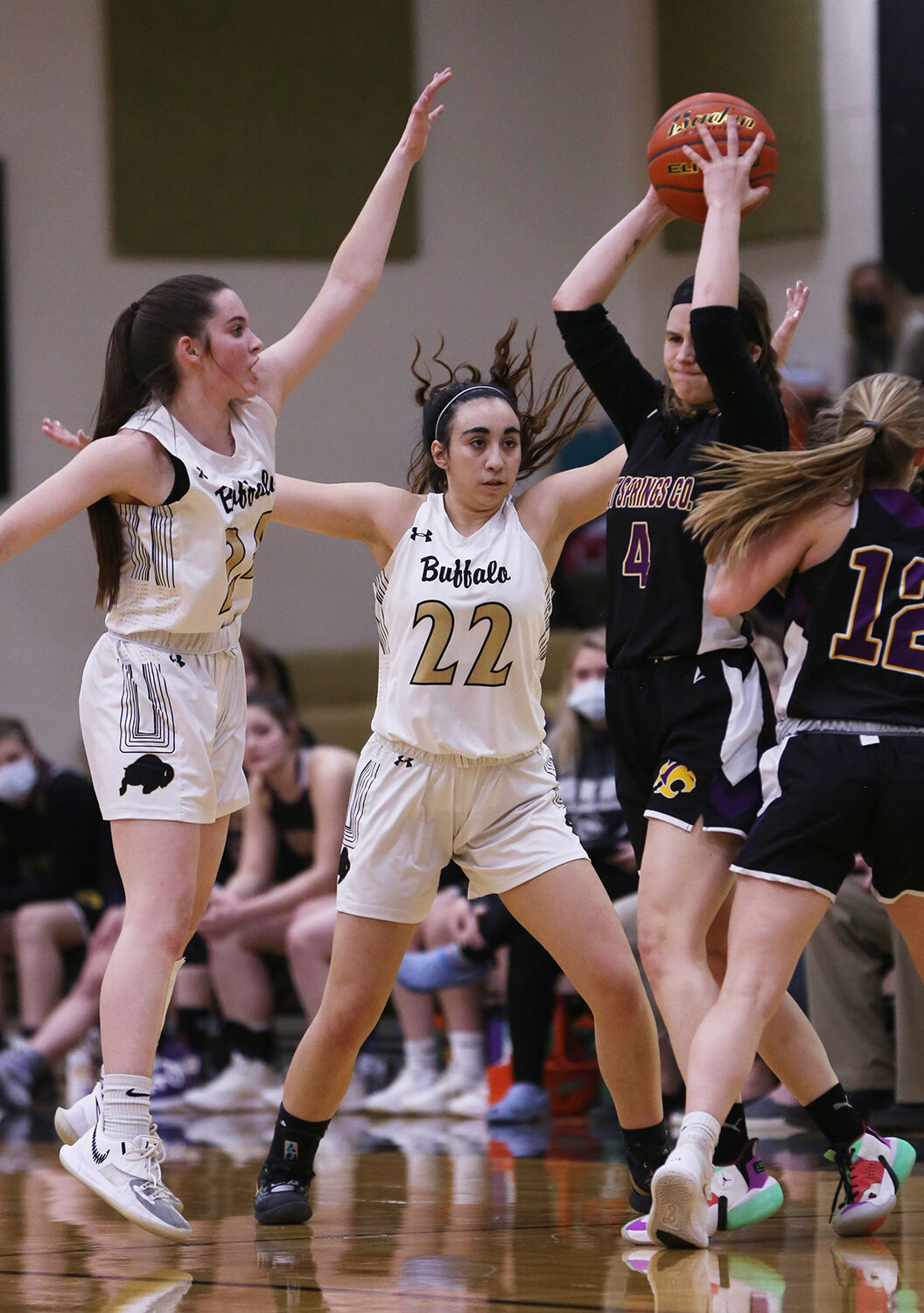 Cassidy Bessler, left, and Cantrell Rosalez jump and yell